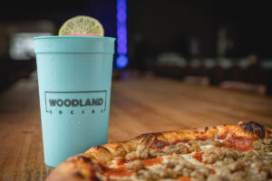 WOODLAND SOCIAL SET TO WELCOME HOUSTONIANS TO ITS EXPANSIVE WOODLAND HEIGHTS VENUE- A MIX OF PATIO BLISS, GOURMET PIZZA, AND VIBRANT SOCIALIZING JUST IN TIME FOR THE BAYOU CITY’S SENSATIONAL SPRING SEASON